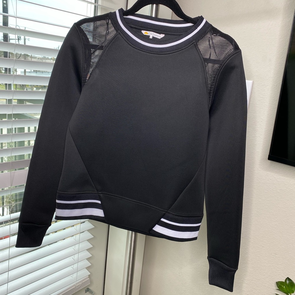Long sleeve structured pull over with mesh shoulders